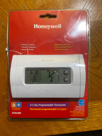 Brand new programmable thermostat RTH230B