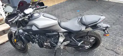 It has been lowered 1" with adjustable lowering link. Has a new battery last year. Hand guards, 2 wi...