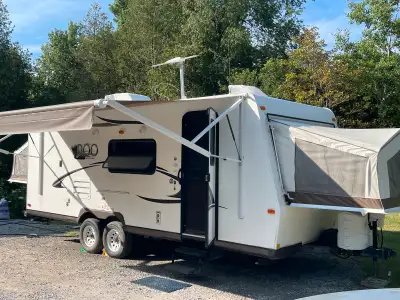 Well-maintained and ready for adventure! This 2014 Rockwood Roo 23SS comfortably sleeps 6 and featur...