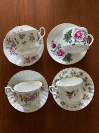 Four China cups and saucers all with roses