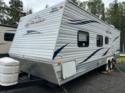 26 1/2 foot Jay flight pull trailer -new hot water tank - just installed 2-6 V batteries everything...