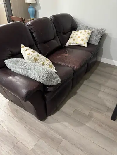 Please text my cell if interested Selling a real La-Z-Boy dark brown leather couch with 2 built-in r...