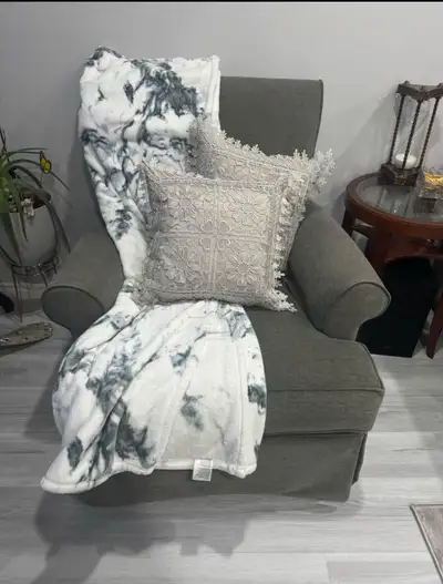 Comfortable rocking chair that swivels! Mint condition! Pick up only.