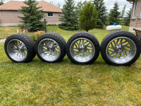 22x12 Fuel Tritons with 305/45R22 Toyo AT 3