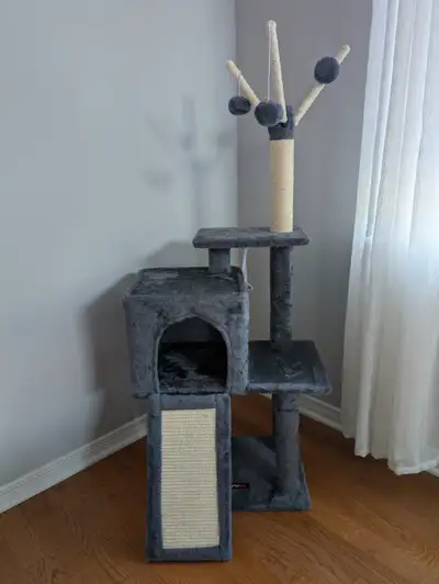 Selling a modern cat tree/tower in like-new condition. 3-tier design with multiple platforms Cozy cu...