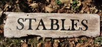 HANDPAINTED STABLES SIGN ON RECLAIMED WOOD FROM A BUGGY