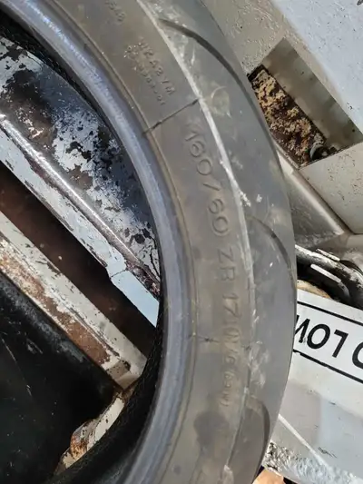 Offering a pair of used Michelin Power Radial tires, sized 120/70 ZR 17 (front) and 160/60 ZR 17 (re...
