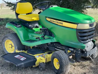 I am selling my John Deere X324 lawn tractor powered by a 24hp Kawasaki engine. The tractor has ~120...