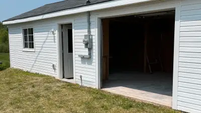 Newly renovated 850 square foot heated garage for lease 52’Lx 16’Wx 8’H New 200 Amp Service - new el...
