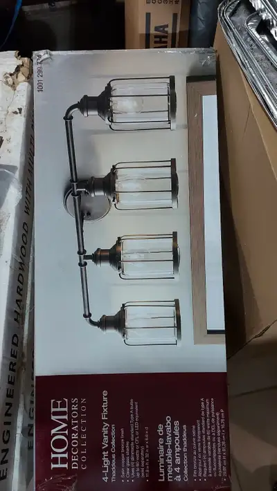 - Home Decorations Collection - Brand new; still in box - 4-light Fixture