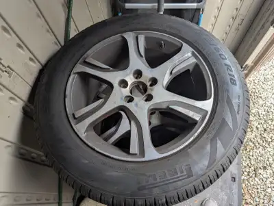 Selling a complete set of Pirelli Scorpion Zero All-Season tires with alloy rims, size 235/60R18 103...