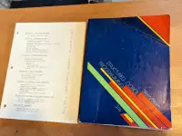 COBOL programming book with vintage microprocessing book