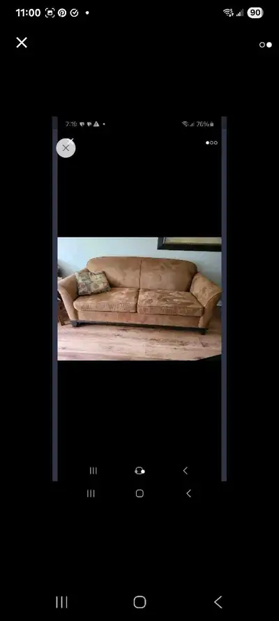 Beautiful sofa and loveseat set for sale. Made with true suede in a warm chestnut color, featuring e...