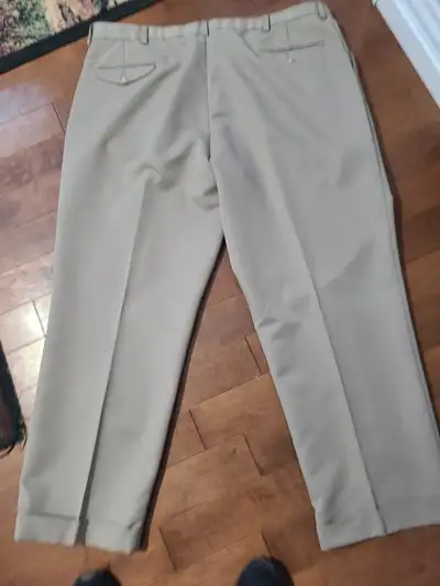 Size 44x30 Mens dress pants - brand Wrangler - new - never worn Cash only please. Need to pick up. I...