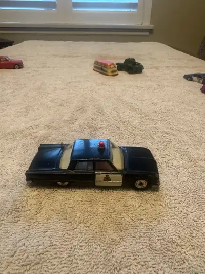 Vintage Dinky Toys Ford Fairlane Police Car die-cast model made in England by Meccano Ltd. in the 19...