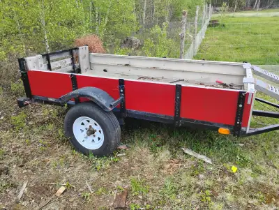 2002 utility trailer 4x8 bed 1 foot high aluminum sides and front comes with 500 lb (X2)rated atv ra...