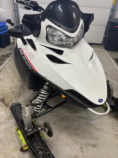 Electric start, reverse, no studs, new belt, 13,200 km, runs well, $2450