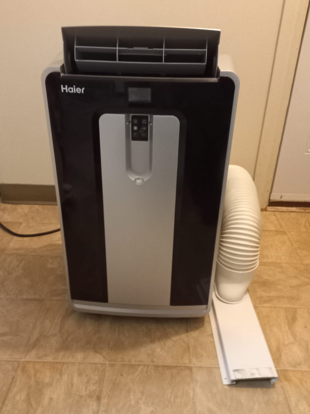 Air conditioner 10000 btu to 12000 like new Heaters, Humidifiers