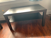 Coffee table with bottom shelves 