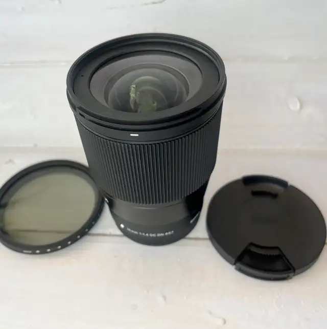 Sigma 16mm f/1.4 Canon EF-M + ND Filter – Mint63735878204289124
