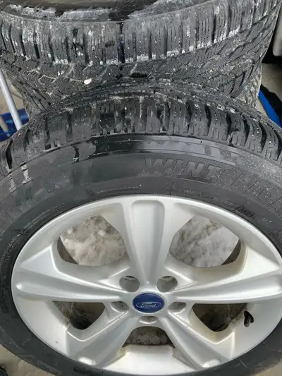 4 Firestone winter tires with TPMS Sensors on rims ,only used for 2months . Paid over 1,200 dollars...