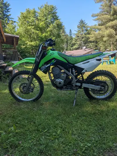 2013 Kawasaki KLX140. Runs smoothly. Only used occasionally on trails at trailer up north. Sold as i...