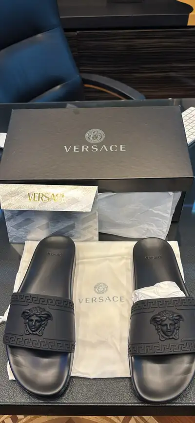 Brand new designer pool slides from Versace, size EU 41 (US M 8 / W 9.5, UK 7). Only tried once on i...