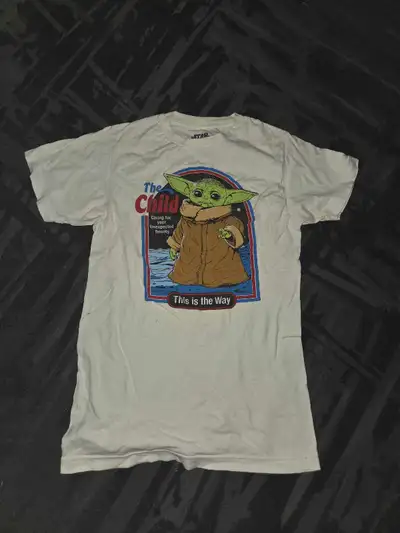 This is a Star Wars The Mandolorian 'The Child' T-shirt in a children's size extra-small. This shirt...