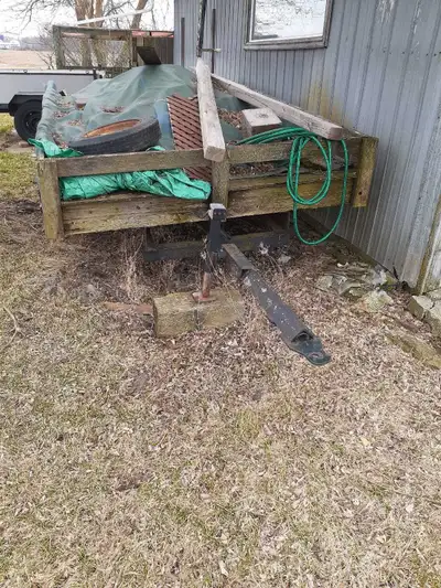 This is a homemade utility trailer, was used on farm for hauling logs out of bush for Firewood. The...