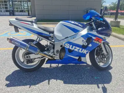 For sale is a Suzuki GSX-R motorcycle, a high-performance sportbike known for its impressive power a...