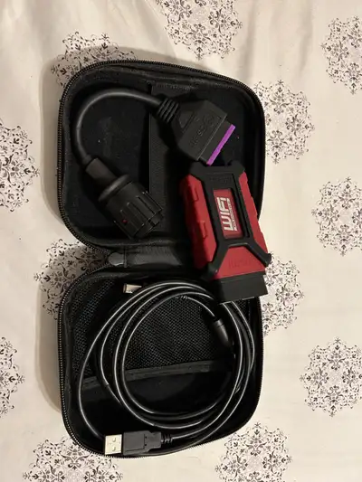 UP FOR SALE GS911 DIAGNOSTIC TOOL WIFI AND USB NEW, NEVER USED, ENTHUSIASTIC VERSION.