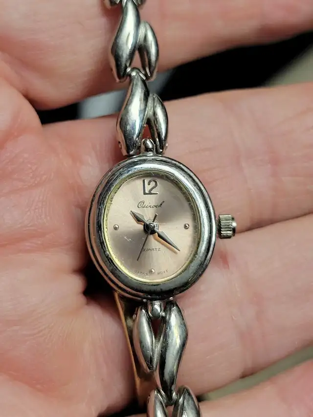 Ladies Osiroc champagne dial, silver  bracelet watch 