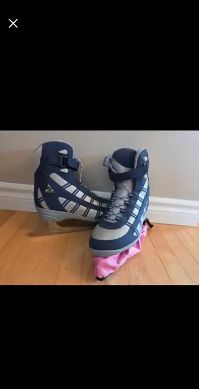 Like New. Size 7.  Softek figure skates with Elike skate guards., View more