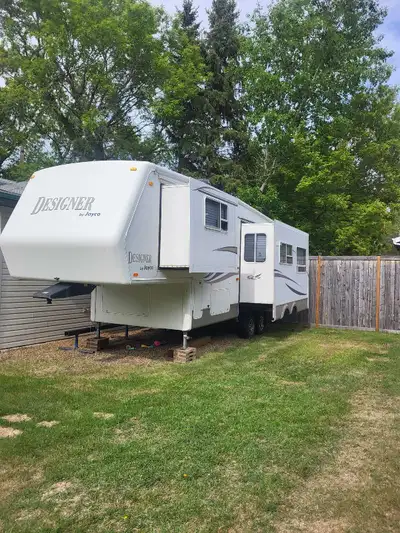 2001 Jayco Designer good condition $10,500 or trade for Small acreage tractor or bumper pull trailer...