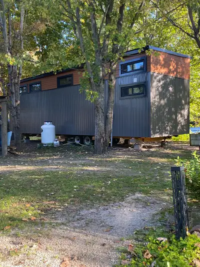 I am selling my used tiny house/bunkie, which features key specifications designed for comfortable a...