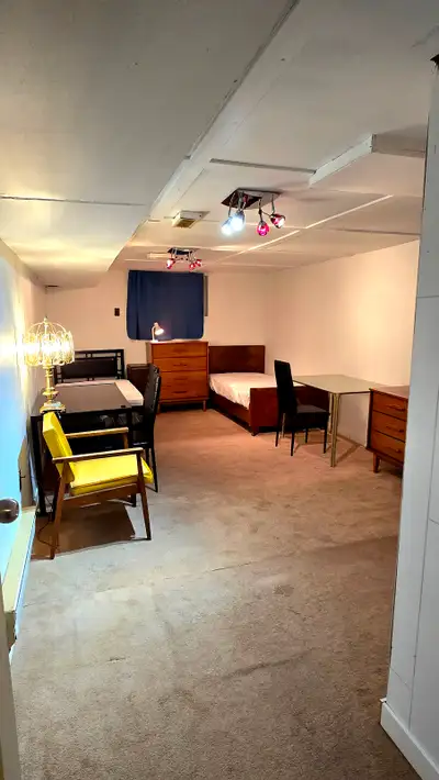 Available March 15. Very large furnished room with bright window on the lower basement floor availab...