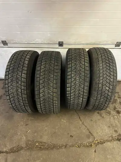 4-235/65R17 BRIDGESTONE/MICHELIN WINTER TIRES Will remove when sold. SAVES YOU ASKING IF THEY'RE STI...