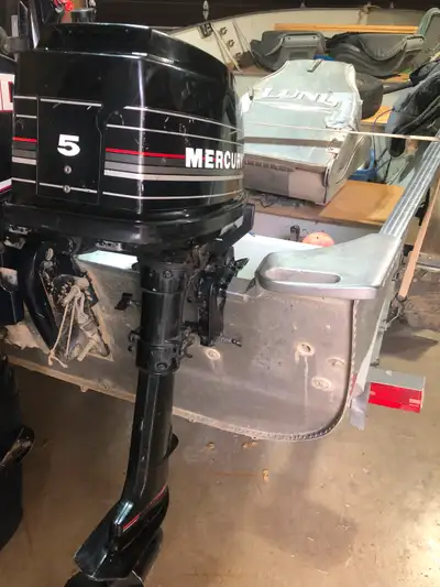 5hp mercury with fuel tank. Excellent condition. Used very little. Always been kept inside.