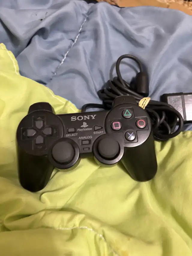 PS2 controller for sale in awesome condition628637294158091226