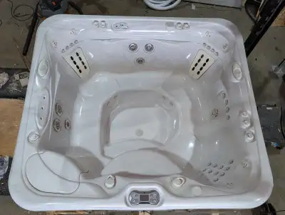 Beautiful Hot Springs spa with a roomy 6-person layout and awesome features for comfort and nighttim...