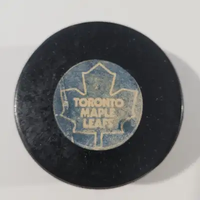 OFFICIAL TORONTO MAPLE LEAFS GAME USED HOCKEY PUCK, View more