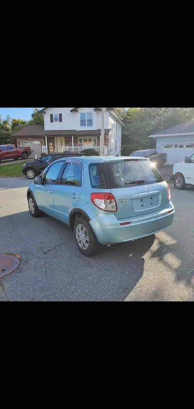 Almost a new MVI, rust free 2009 Suzuki SX4, smooth running fun to drive peppy little car yet easy o...