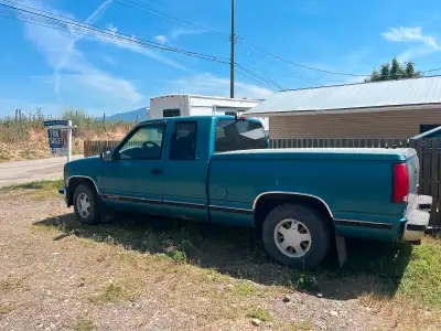 97 GNC CLUB CAB GOOD RUNNING CONDITION, has tunnel cover. Registration is Alberta selling location V...