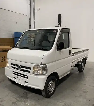 Low kms, 2001 Honda Acty AWD with 5 speed manual transmission, PS. Clean mini Kei truck inside and o...