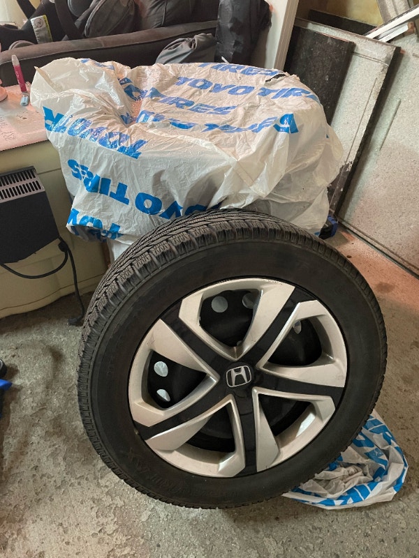 Honda Civic Winter Tires on Rims with ORIGINAL Honda Hub Caps Tires