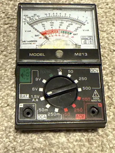 This is a used M213 Multimeter, a handy tool for various electrical measurements. It's in fair condi...