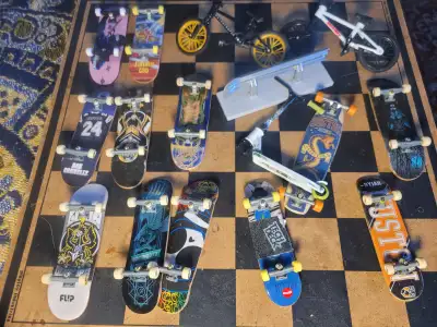 12 tech deck boards....2 finger BMXs, View more