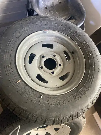 One trailer rim and tire, 175/80/13,$50