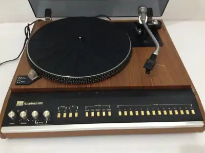 ADC Accutrac 4000 Turntable. The Accutrac 4000 is a direct-drive turntable with automatic track sele...