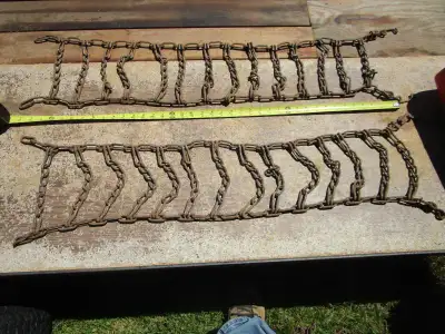Sets of lawn tractor chains----info in photos-----3 sets, two pics of each, bag belongs to last set-...